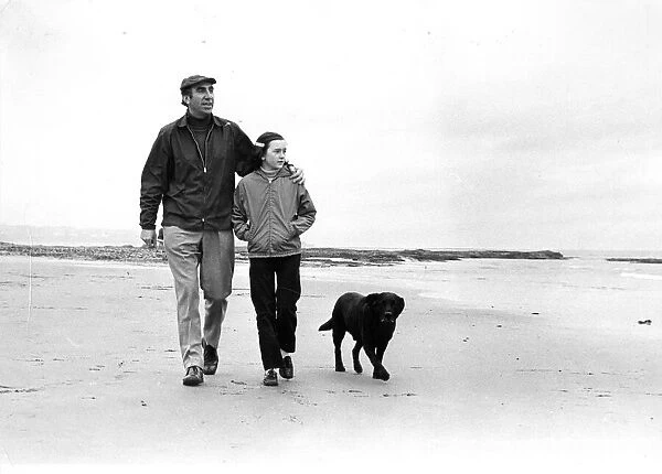Sunderland Associated Football Club - Bob Stokoe walking along the beach with his