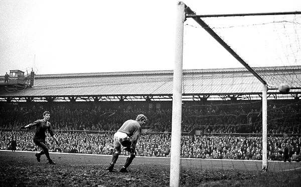 Sunderland goalkeeper Jim Montgomery can only watch a shot from Nobby Stiles which