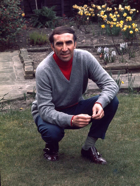 Sunderland manager Bob Stokoe poses in the back garden of his home 1973