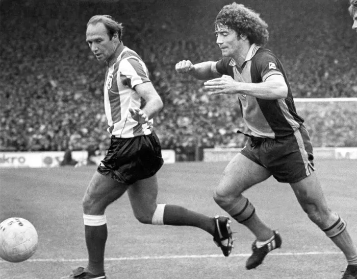 Framed Print : Sunderlands Bryan Pop'Robson gets attention from European Footballer of Framed Print : Sunderlands Bryan Pop'Robson gets attention from European Footballer of