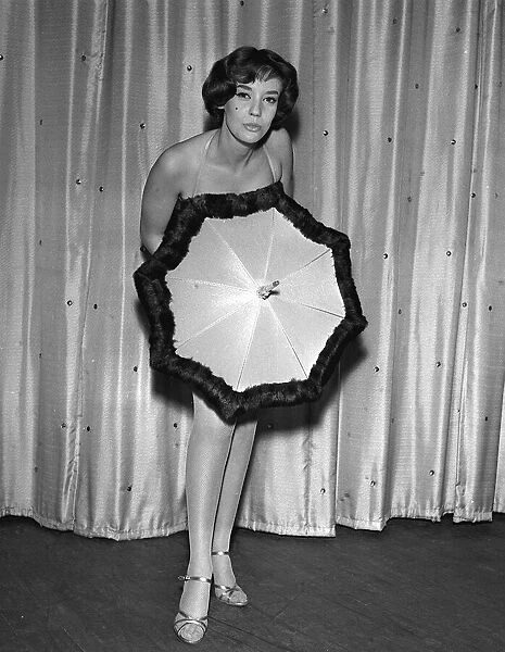 Sunni Cooley 1958 showgirl mink trimmed bikini and umbrella appearing in new floor show
