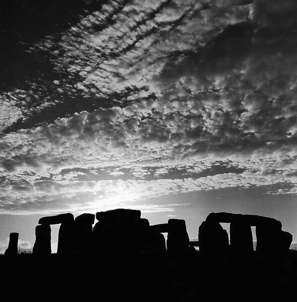 Sunset over Stonehenge in Wiltshire Britain Sunset Silhouette Clouds Druids Country Scene