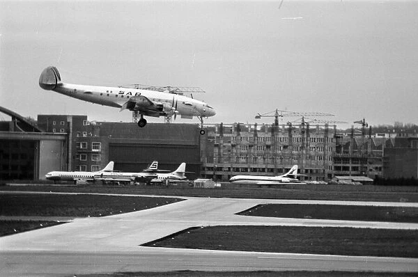 Super constellation aircraft landing at Heathrow Airport. 6th March 1969