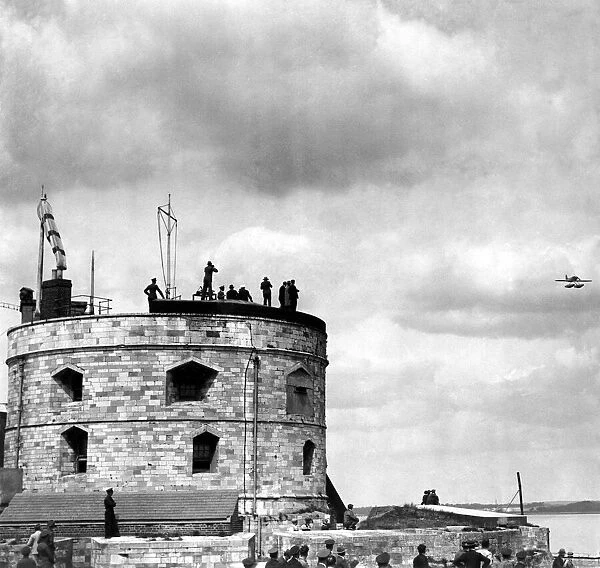 The Supermarine S6  /  b passes the Coastguard tower at Calshot during the 1929 Schneider Cup