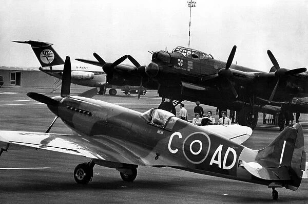 A Supermarine Spitfire Mk PRXIX and Avro Lancaster of the Battle of Britain Memorial