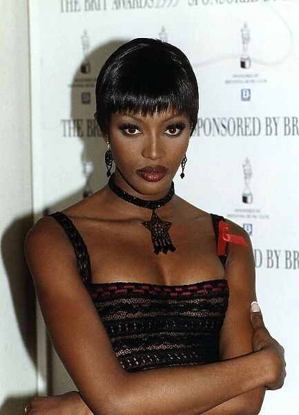 Supermodel, Naomi Campbell, Wearing Black lace dress and Black neck piece