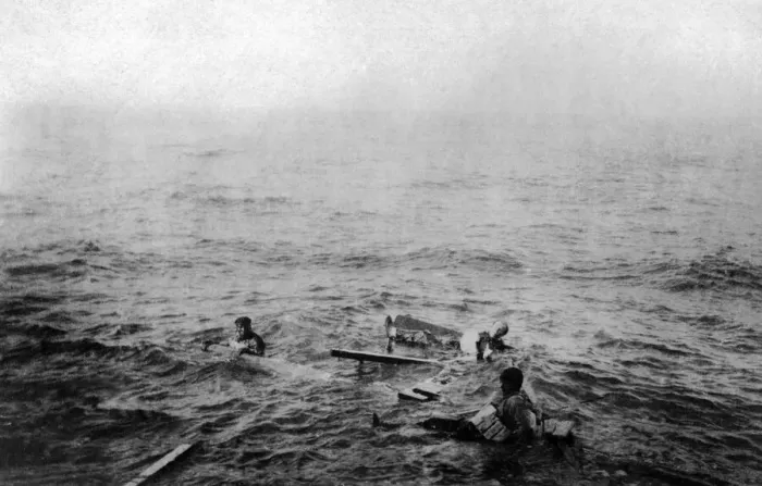 Framed Print : Survivors from a torpedoed merchant ship who survived in the water for a day Framed Print : Survivors from a torpedoed merchant ship who survived in the water for a day
