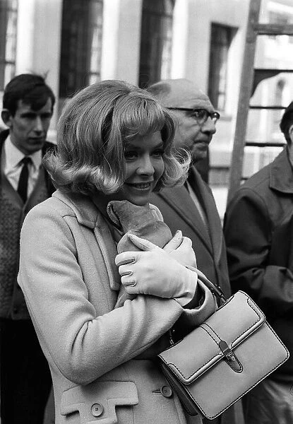 Susannah York Actress, Mar 1966 feeling cold on location clutches a hot water