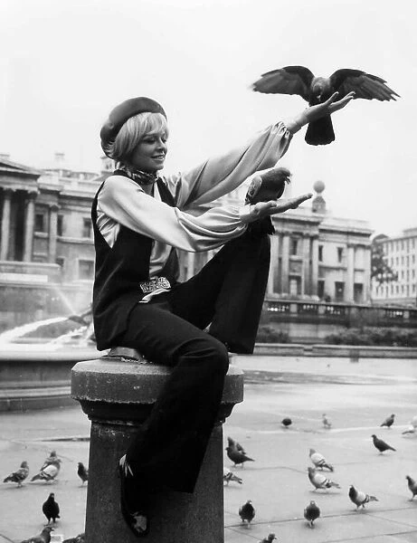 Susannah York feeding the pigeons at Trafalgar Square