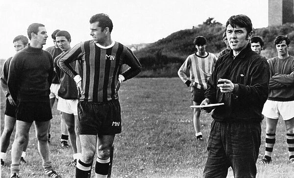 Swansea City footballer Mel Nuse (hands on hips) pictured during a training session