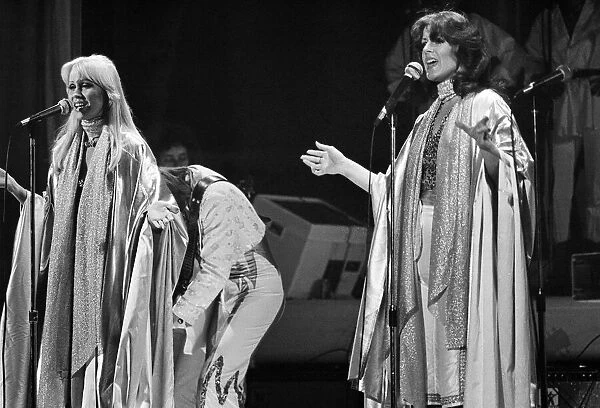 Swedish pop group ABBA consisting of Agnetha Faltskog, Bjorn Ulvaeus, Benny Andersson and Anni-Frid Lyngstad, pictured performing in Birmingham during their Second tour. 10th February 1977