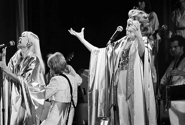 Swedish pop group ABBA consisting of Agnetha Faltskog, Bjorn Ulvaeus, Benny Andersson and Anni-Frid Lyngstad, pictured performing in Birmingham during their Second tour. 10th February 1977