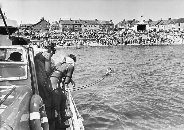 A swimmer is hauled to safety near Morpeth, Tyne and Wear
