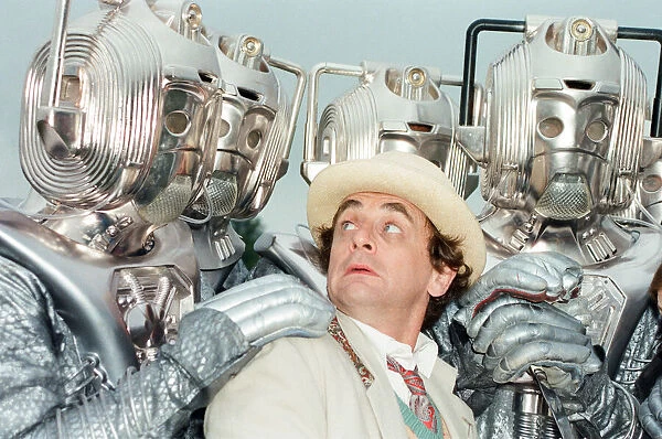 Sylvester McCoy as the Doctor seen here on location near Arundel with the Cybermen during