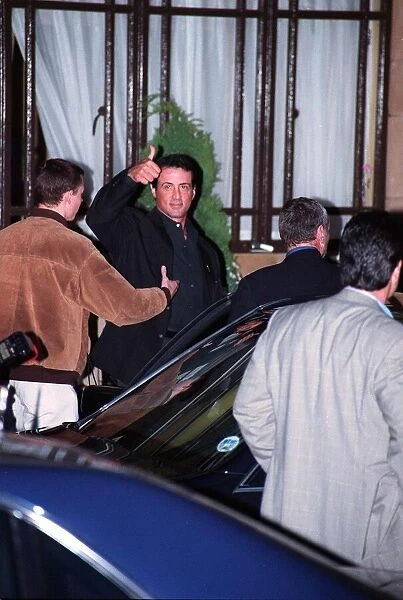 Sylvester stalloneActor leaving hotel with minder