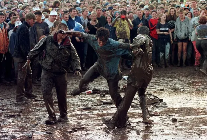 Framed Print : T in the Park July 1997 People mud fighting at T in the Park at Balado Airfoeld near Framed Print : T in the Park July 1997 People mud fighting at T in the Park at Balado Airfoeld near