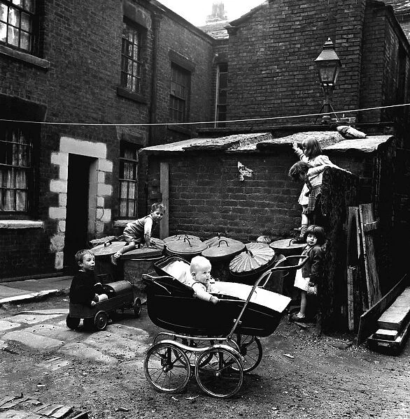 Taken from a set of pictures showing slum housing in post war Britain