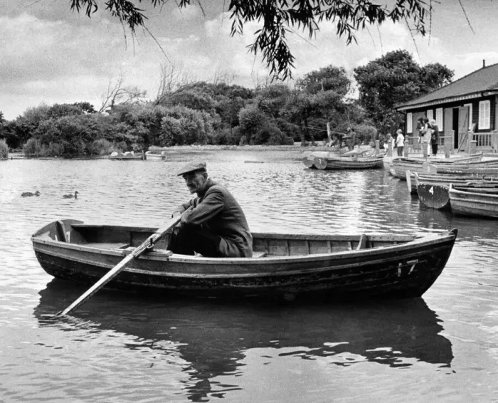 Framed Print : Taking a well earned rest after a busy season is Redcar boating lake attendant Joe Lloyd