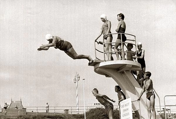Taking The Plunge... 75 year old Molly Pendleton diving from a 16ft. 6in diving board
