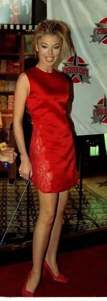 Tamara Beckwith at the opening of the Fashion Cafe wearing a little red dress