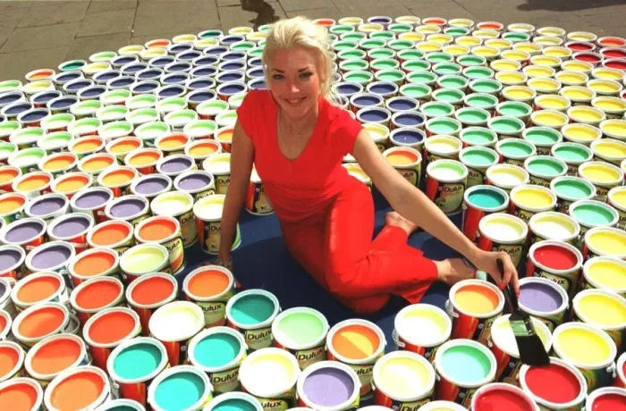 Framed Print : Tamara Beckwith Socialite sits amongst paint pots July 1999 at a launch signalling Framed Print : Tamara Beckwith Socialite sits amongst paint pots July 1999 at a launch signalling