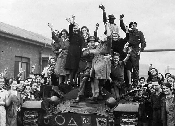 Tank Crew receive a cheery greeting when they visited a Government factory in the North