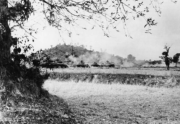 Tanks of B Squadron King George Vs Own 19th Lancers firing on Japanese positions in
