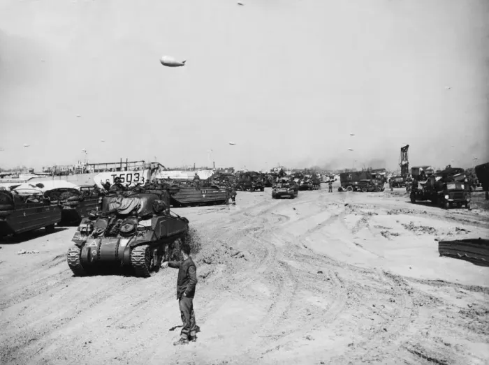 Framed Print : Tanks and equipment being unloaded on the beaches of Normandy. 9th June 1944 Framed Print : Tanks and equipment being unloaded on the beaches of Normandy. 9th June 1944