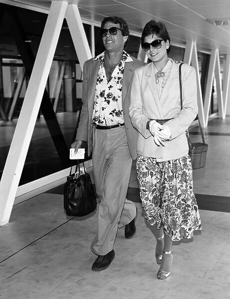 Tatum O Neal and her father Ryan O Neal leaving London Airport for Los Angeles