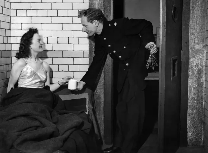 Framed Print : Your tea, madame'says the Lake District constable as he opens up the cells to Framed Print : Your tea, madame'says the Lake District constable as he opens up the cells to