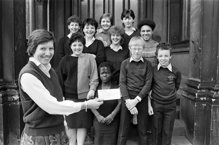 Framed Print : Teacher Miss Sally Cox displays a £65 cheque for the Huddersfield Hospice Appeal Framed Print : Teacher Miss Sally Cox displays a £65 cheque for the Huddersfield Hospice Appeal