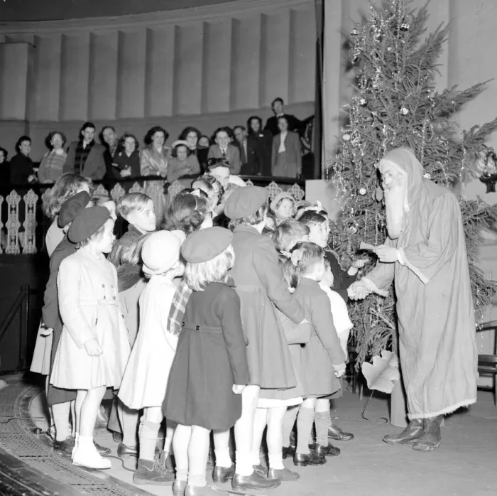 Framed Print : A Teddy Boy dressed as Father Christmas hands out presents at the Christians Rendezous Framed Print : A Teddy Boy dressed as Father Christmas hands out presents at the Christians Rendezous