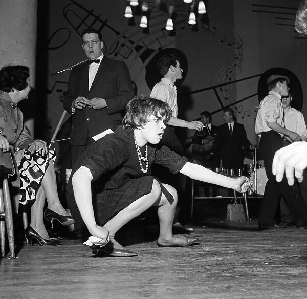 Teenage contestants during a 32-hour twisting competition at Embers Ballroom, Harlow