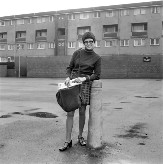 Framed Print : Teenage girl from Toxteth in Liverpool delivering newspapers on a paper round