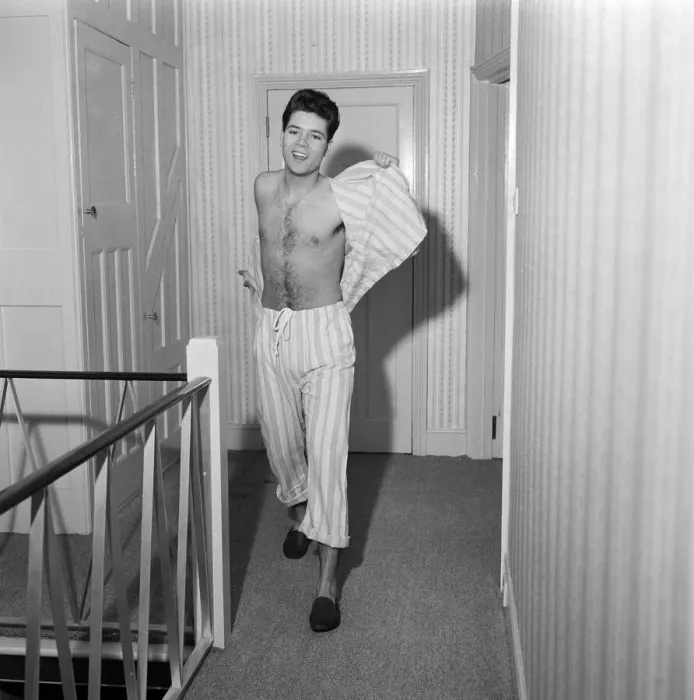 Framed Print : Teenage pop idol Cliff Richard relaxes on his divan at his Winchmore Hill home Framed Print : Teenage pop idol Cliff Richard relaxes on his divan at his Winchmore Hill home
