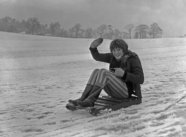 Teenager enjoying the snow in a Bristol park 31st December 1961