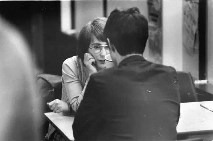 Framed Print : Teenagers enjoy the social side of a Youth Club, chatting and reading Framed Print : Teenagers enjoy the social side of a Youth Club, chatting and reading