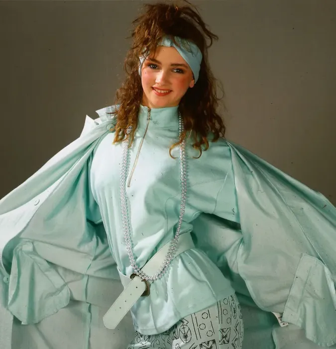 Framed Print : Teenagers fashion, April 1987 Model wearing lime green raincoat, top and leggings