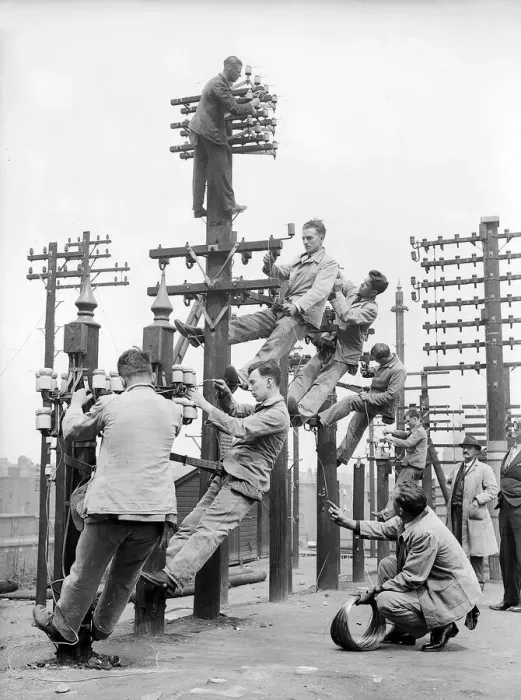 Framed Print : Telephone Engineers - Men working up telephone poles. Circa 1950 Framed Print : Telephone Engineers - Men working up telephone poles. Circa 1950