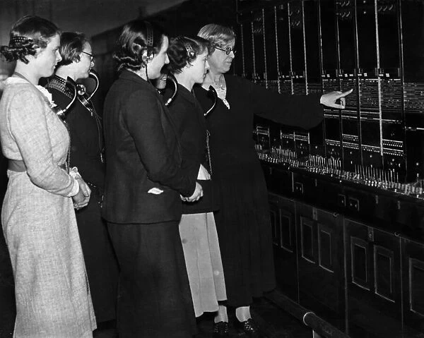 Telephonist school: - Pupils receiving instructions on the operation of the switchboard