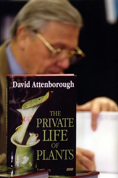 Television presenter and broadcaster David Attenborough signing books at Waterstones in