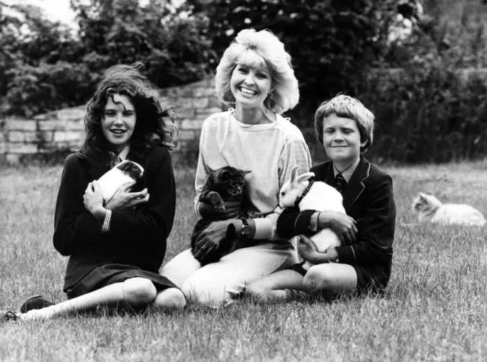 Framed Print : Television presenter Cathy Secker with Jane, David, a guinea pig, cat and rabbit Framed Print : Television presenter Cathy Secker with Jane, David, a guinea pig, cat and rabbit