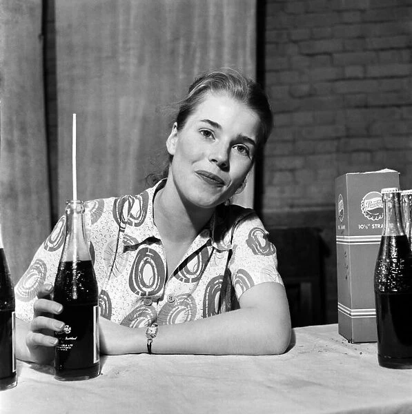 Television Presenters: Joan Aubrey and Bernard Lee seen here enjoying a Pepsi Cola