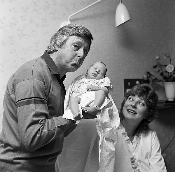Television star Michael Aspel with his wife Lizzie Power