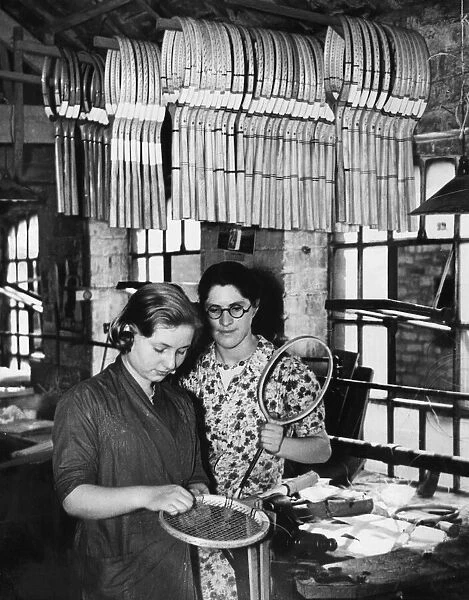 Tennis rackets being strung at the Birmingham factory of Messers Clapshaw