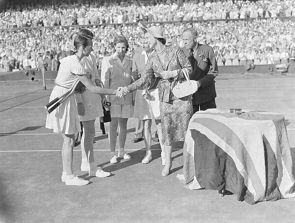 Tennis Wimbledon Womens Double Final. 1949 Duchess of Kent shaking hands with