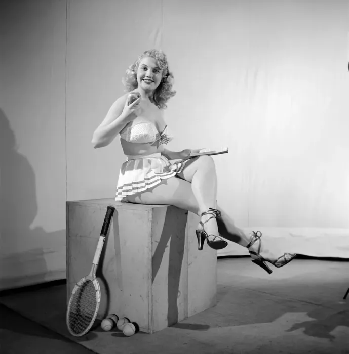 Framed Print : Anyone for tennis? Woman wearing bra, skirt holding tennis racket. 1959 Framed Print : Anyone for tennis? Woman wearing bra, skirt holding tennis racket. 1959