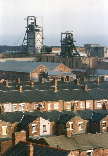 Terraced streets of Easington with the gear towers of the local pit head in