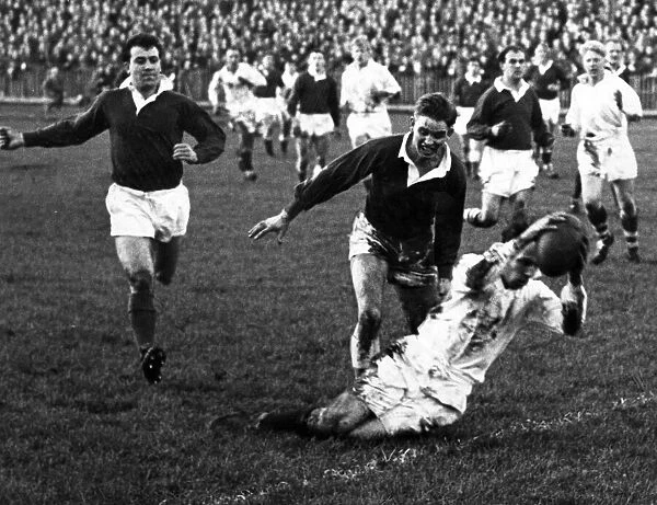 Terry Davies in action for Llanelli RFC. 3rd January 1959