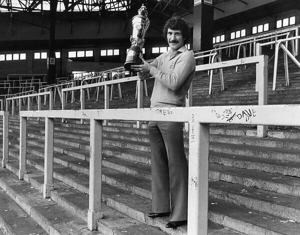Terry McDermott Liverpool midfielder holding Player of the Year Trophy at The Kop